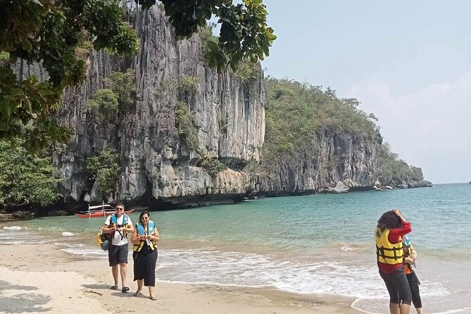 6D5N Puerto Princesa and El Nido Tours with hotel - Day 4 El Nido’s Hidden Beach Side: Matinloc and the Helicopter Island Shape
