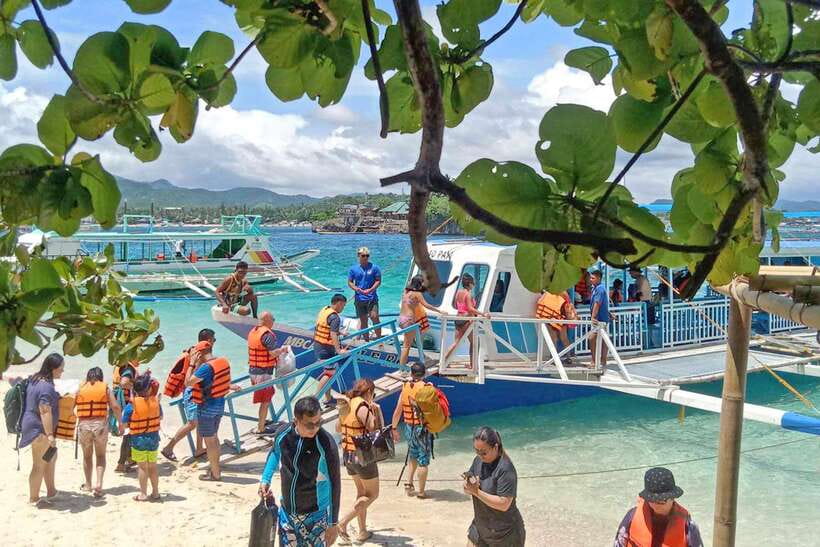 Boracay: Island Boat Tour with Crystal Cove Entry - Getting to White Beach, Finding Your Guide, and Settling In