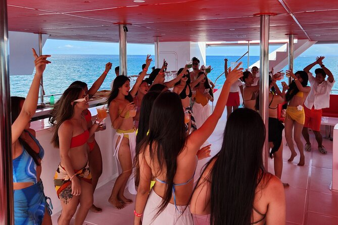 Boracay Sunset Cruise with Party DJ & Unlimited Food and Drinks - Stop 1: Angol Beach, cookies and drinks to kick off the fun