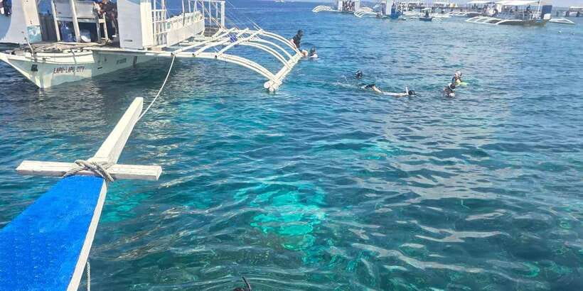Cebu Island Hopping with Lunch - Nalusuan Island lunch and swim: eat local, then cool off