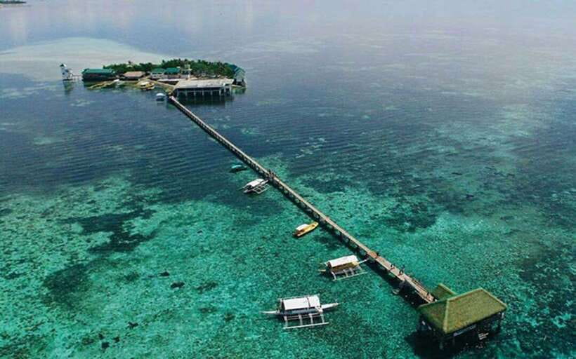 Cebu: Mactan Island Hopping Boat Tour with Lunch - Caohagan Island: white sand swimming and a calmer beach break