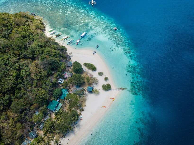 Coron: Coastal Cliffs, Beach & Malcapuya Island Hopping Tour - Banana Island, Malcapuya Island, Bulog Dos Island, the island order and what to expect