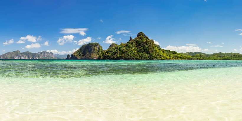 Coron Island Escapade: A Tropical Feast & Adventure - Where you start in Coron Town Proper, and what that means for your day