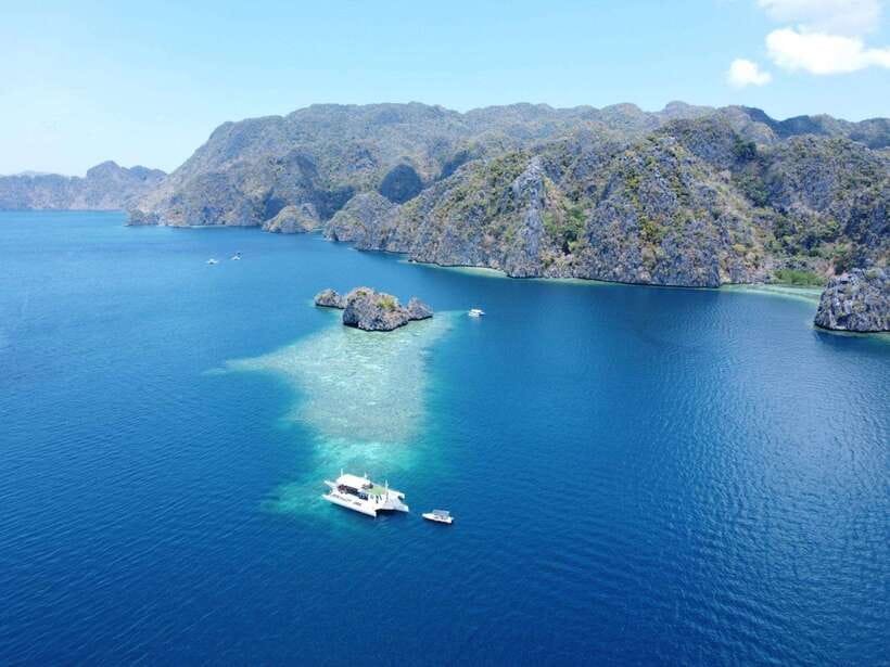 CORON:ISLAND TOUR A Lakes and Snorkeling with Corals - Kayangan Lake: the morning swim with a short viewpoint hike