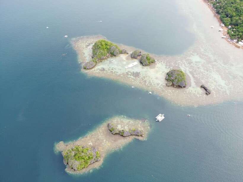 Coron: Kayangan Lake, Twin Lagoon, and Siete Pecados Tour - Atuan Beach, Skeleton Wreck, and CYC Beach: breaks with variety