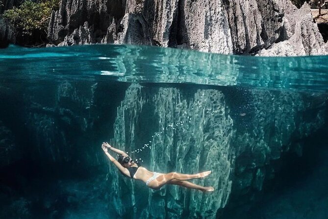 Coron Palawan Snorkeling & Island Hopping Tour (Private) - Kayangan Lake: clear freshwater, caves and islets, and a lot of steps