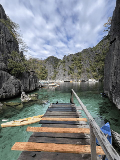 Coron: Private Boat Hire with Guided Tour and Lunch on Beach - Your 7:30 AM start at Lualhati Park (I AM CORON sign)