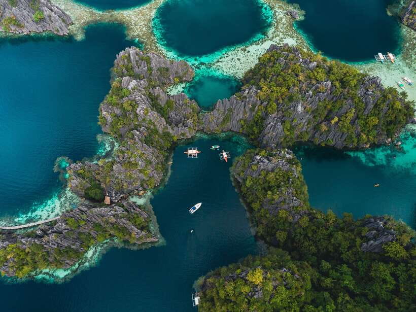 Coron: Private Island-Hopping Tour on a Yacht or Speedboat - Leaving Coron Harbor Square, in your own rhythm