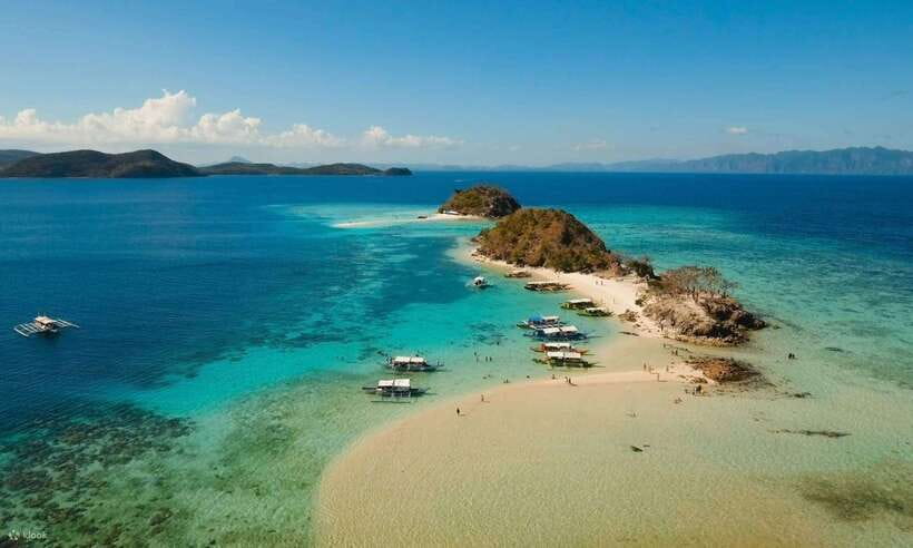 Coron Town: Coron Island Escapade Private Tour with Lunch - Getting on the water: pickup, boat comfort, and swim-ready gear