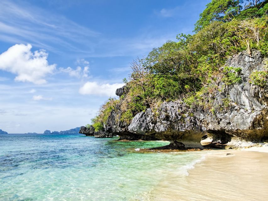 El Nido: Full-Day Premium Island Hopping Catamaran Cruise - Big Lagoon, Hidden Beach, Seven Commandos, and the Other Named Stops