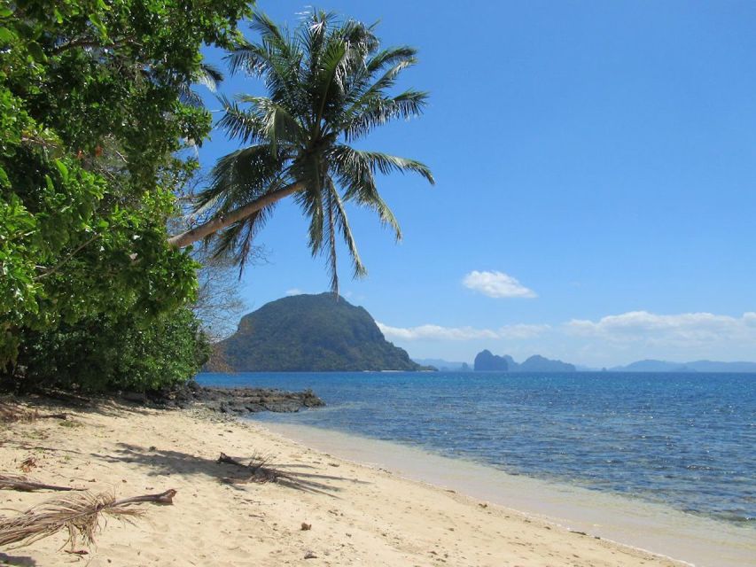 El Nido: Full-Day Premium Island Hopping Catamaran Cruise - Seacret Catamaran Comfort, Snacks, and the Small-Group Feel