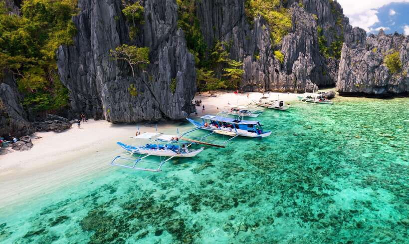 El Nido: Private/Exclusive Island Hopping Tour A BEST PRICE! - Seven Commandos Beach: WWII vibes plus a calm swim pause