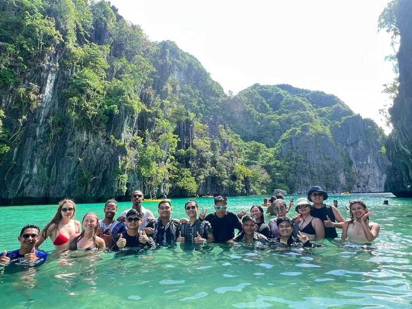 El Nido: Shared Island Hopping Tour C with Buffet Lunch - Hidden Beach: The Swim-Through Moment You’ll Remember