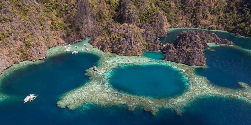 From Coron: Island Hopping Boat Day Trip with Buffet Lunch - Malcapuya Island and the reef stop names you’ll hear during the day