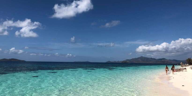 From Coron: Private Island-Hopping Cruise with Lunch - Bulog Island: Corals, a Long Sandbar Moment, and Fun Water Time