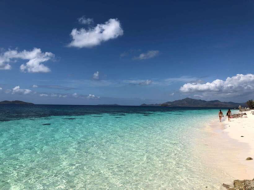 From Coron: Private Island-Hopping Cruise with Lunch - Getting From Coron Town to the Islands: Smooth Pickup, Private Boat Rhythm