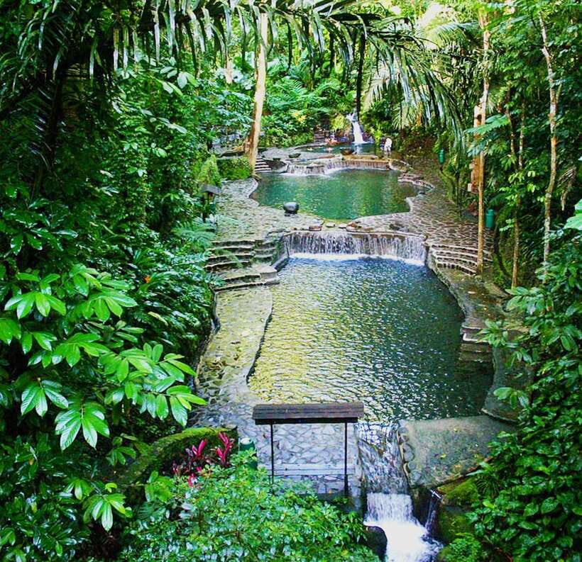 From Manila: Day Tour to Enchanting Hidden Valley - Entering the resort grounds: orchids, myths, and plant-focused exploring