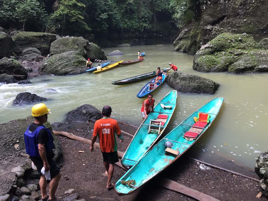From Manila: Taal Volcano Island & Pagsanjan Falls Day Tour - Pagsanjan Falls paddle rafting, rapids, and that big swim-in-water moment