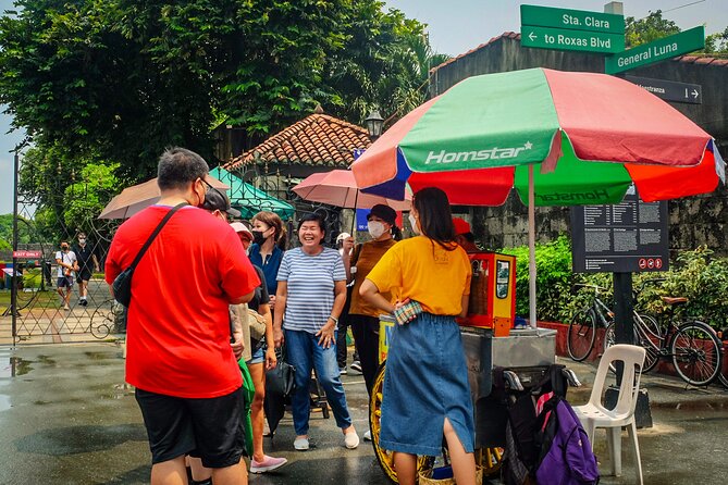 Intramuros Walking Tour with Transportation by Don't Skip Manila - Morning atmosphere at Manila Bay’s coconut-lined promenade