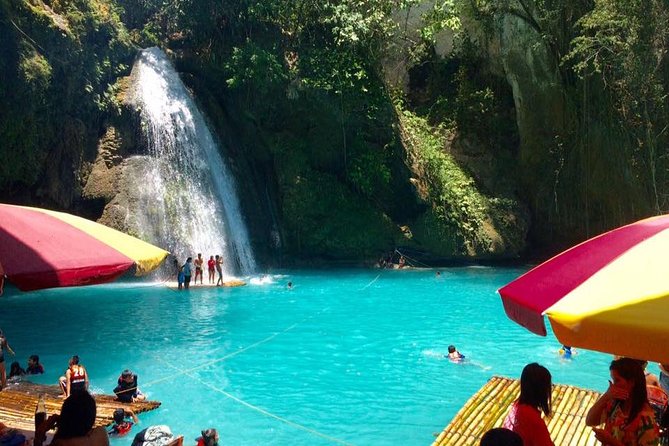 Kawasan Falls and Mantayupan Falls in One Day from Cebu - Mantayupan Falls: two levels, bluish green water, and the mini hydro setup