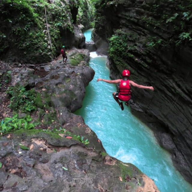 Kawasan Falls Canyoneering Transfers from Cebu with Lunch - Inside the canyon: climbing, jumping, and swimming pools