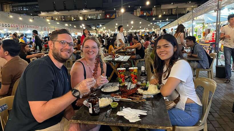 Makati Street food walking tour with Dinner - Open stand halls, live music, and the Makati rhythm you can feel