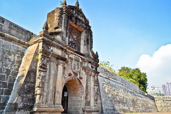 Manila Old and New: Sightseeing Tour Including Intramuros and Fort Santiago - Walking Intramuros walls: history you can touch