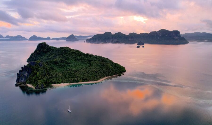 Palawan: Private Sailing Yacht Cruise in El Nido - Malpacao Island: Desert Beach Time, Snorkeling Gear, and Lunch Aboard