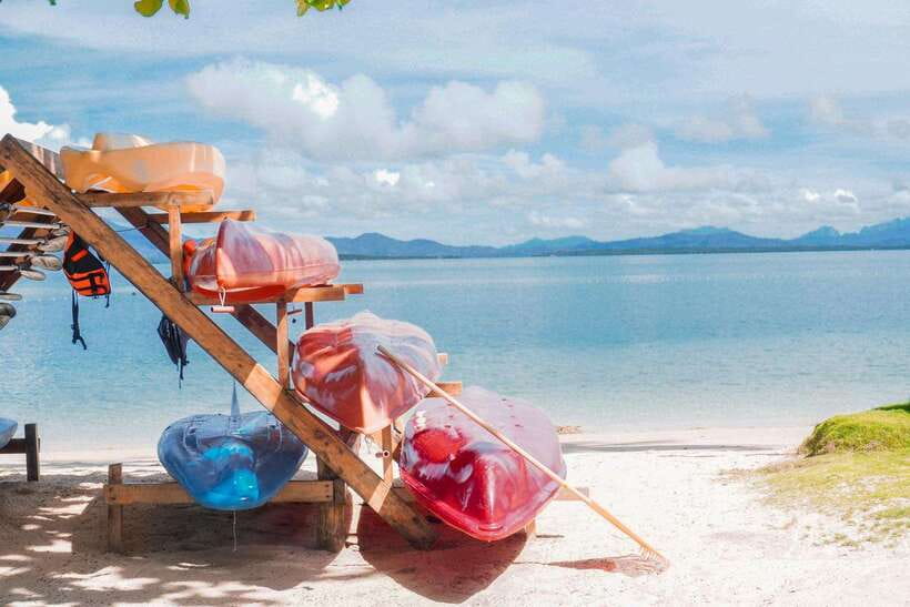 Puerto Princesa: Cowrie Island Guided Day Tour with Meal - Van to Honda Bay, then a short boat ride