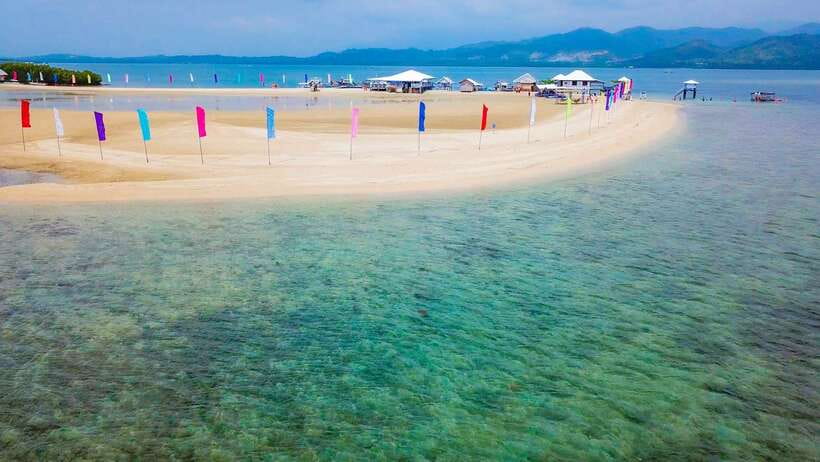 Puerto Princesa: Private Honda Bay Island Hopping Tour - Entering Honda Bay by private boat, not by crowd