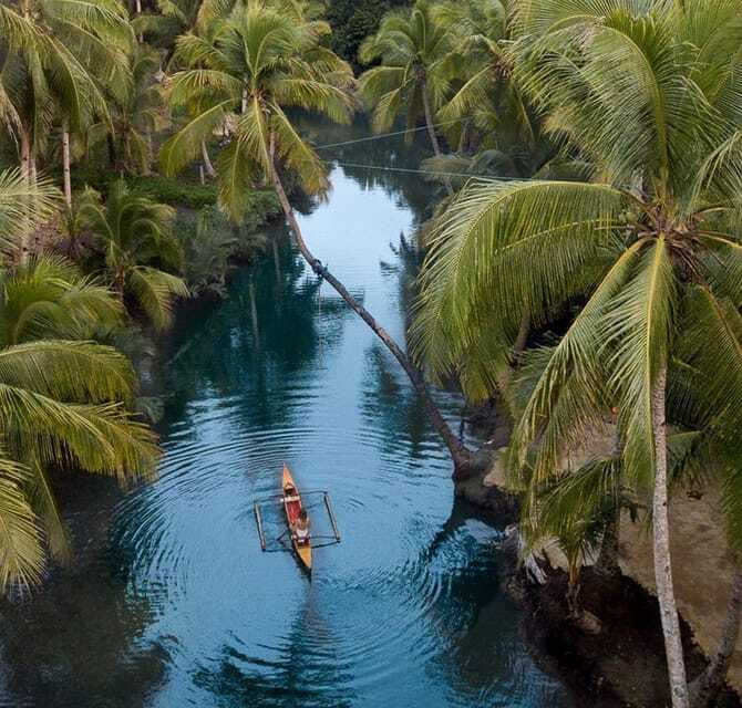 Siargao Land Tour Adventure - Maasin Bridge River Swing: a scenic break with a little action