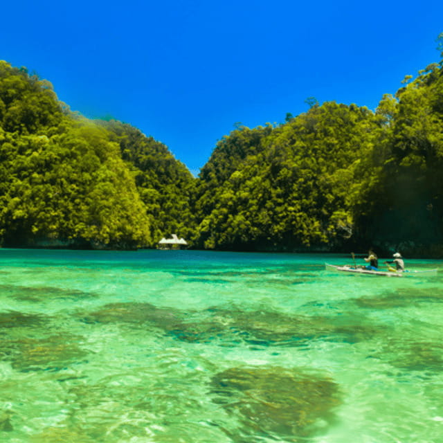 Siargao:Sohoton Island Hopping Tour with Jellyfish Sanctuary - Sohoton Cove: the lagoon, the half-submerged cave entrance, and the boat-hopping flow